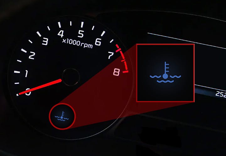 Niebieska kontrolka płynu chłodzącego silnik: Co to oznacza? 🥶