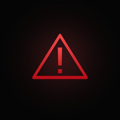 Red triangle warning light