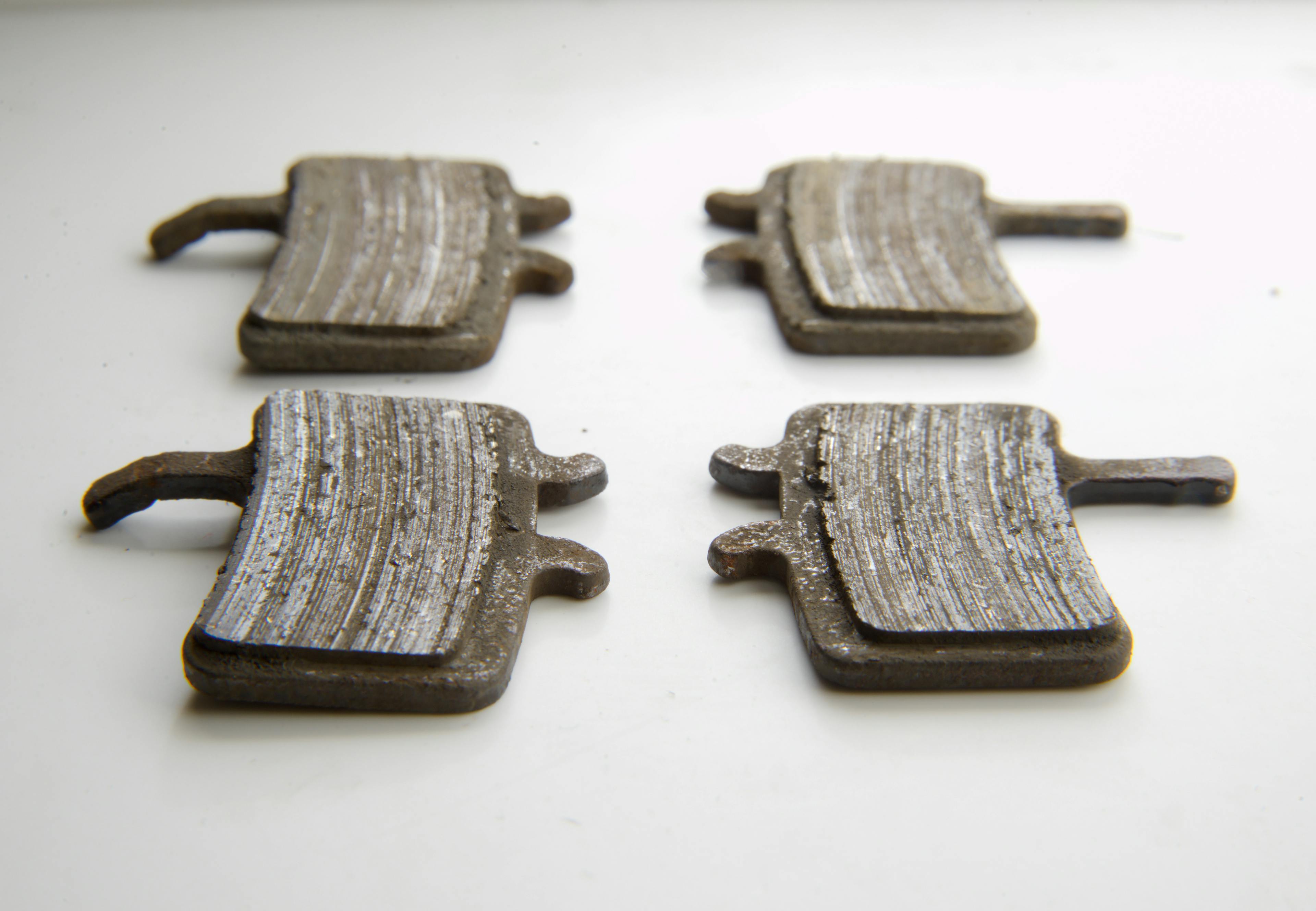 Worn metal brake pads